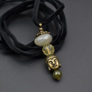 Green stone crystal and Buddha charm necklace, thin black velvet lace choker